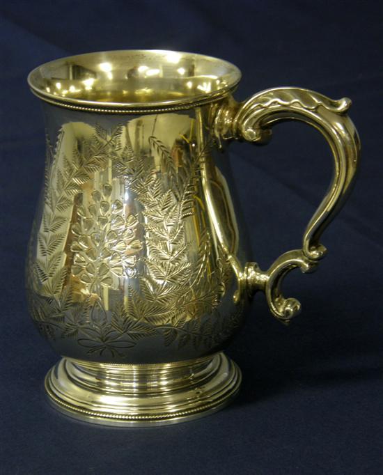 Appraisal: Victorian silver baluster mug with scroll handle and engraved with