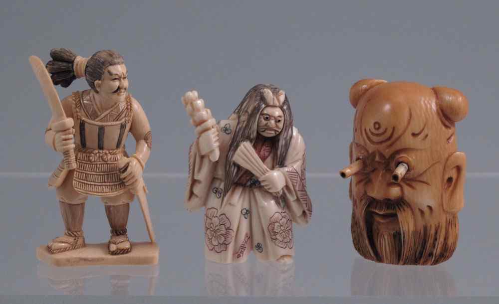 Appraisal: JAPANESE FIGURAL CARVED IVORY NETSUKE To include Wise man with