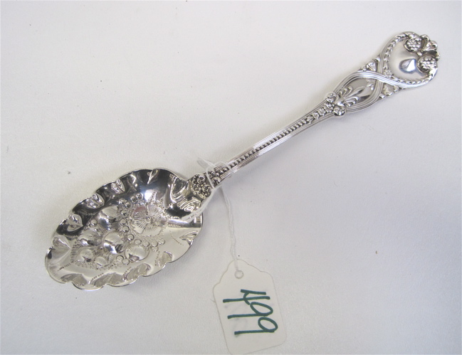 Appraisal: TIFFANY CO STERLING SILVER BERRY SPOON with repousse bowl Pat