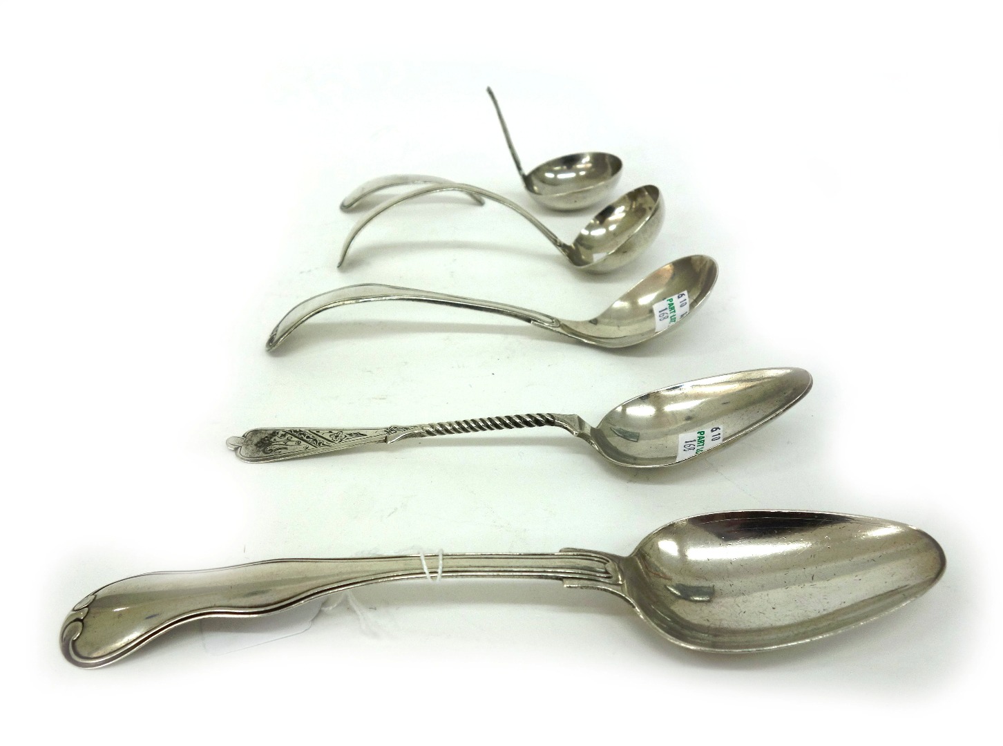 Appraisal: A collection of five Dutch silver spoons and sauce ladles