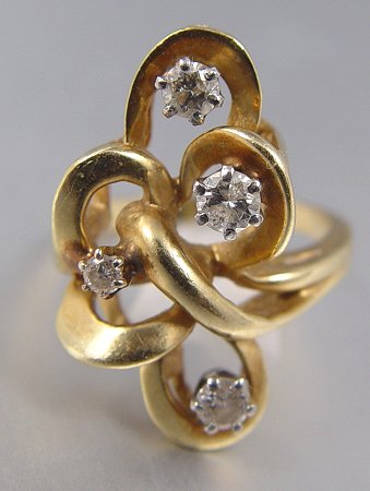 Appraisal: K FREEFORM DIAMOND RING K yellow gold freeform ring contains