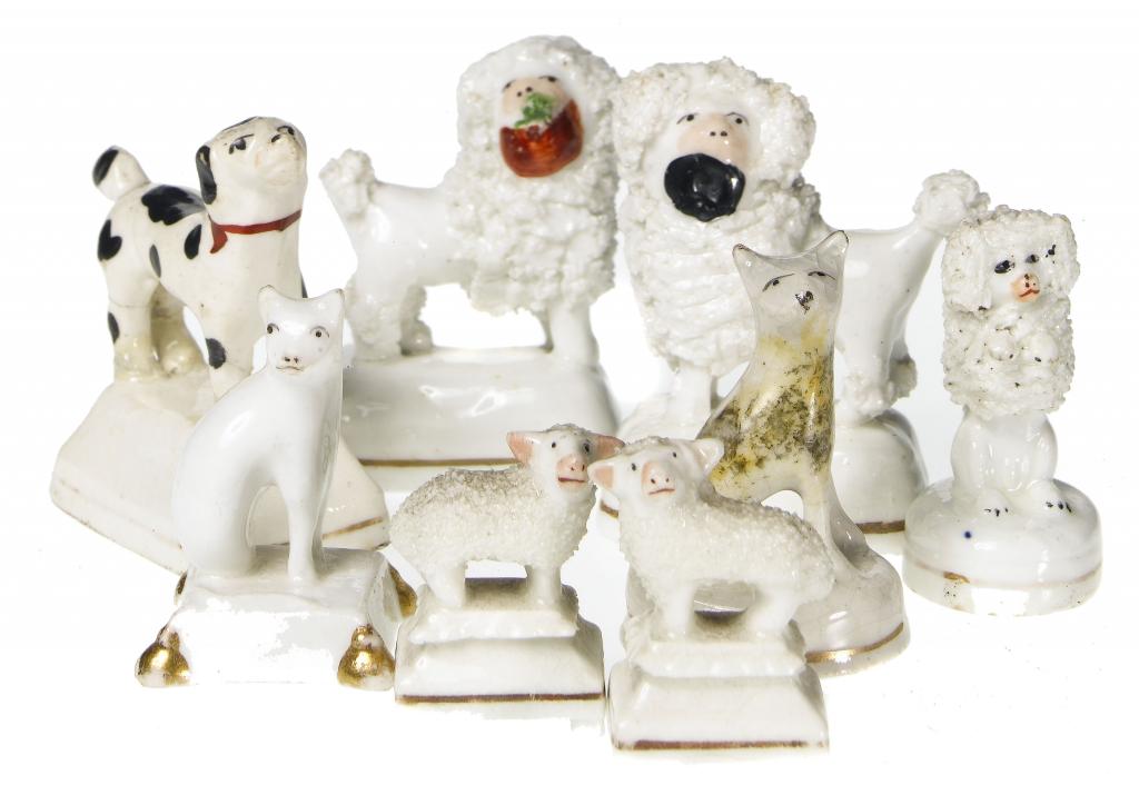 Appraisal: A STAFFORDSHIRE MINIATURE MODEL OF A CAT AND SEVEN OTHER