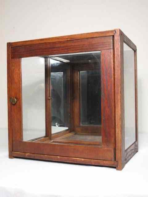 Appraisal: Early th century oak display case Glass on top and