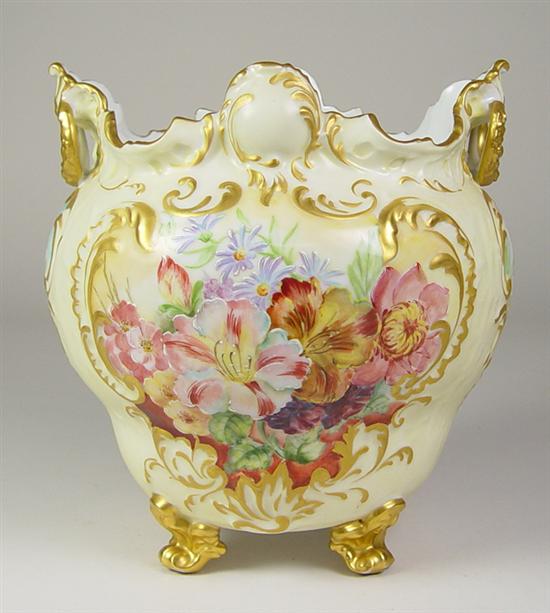 Appraisal: Hand-Painted Floral Porcelain Limoges Vase Four-footed vase with colorful flowers