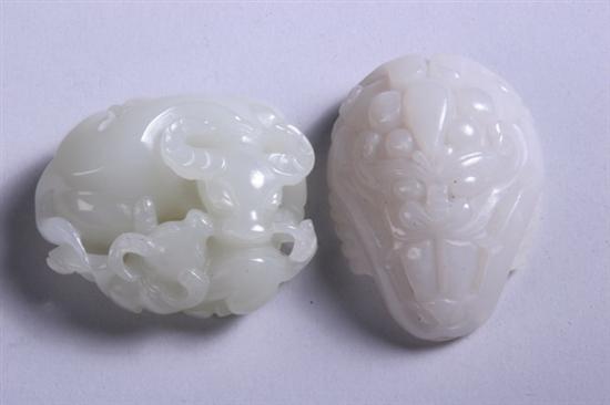 Appraisal: TWO CHINESE WHITE JADE CARVINGS One two water buffalo on