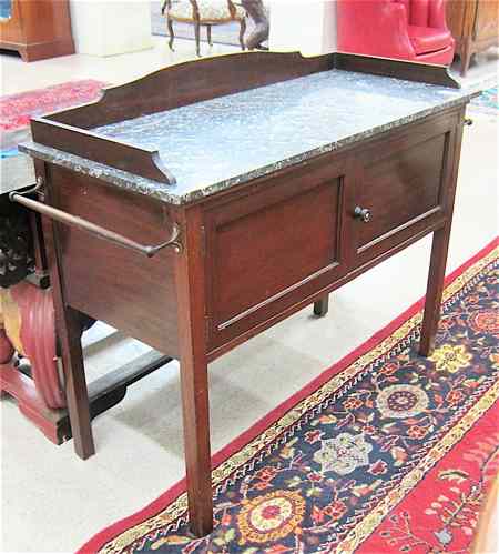 Appraisal: LATE VICTORIAN MARBLE-TOPPED MAHOGANY WASHSTAND English c having a rectangular