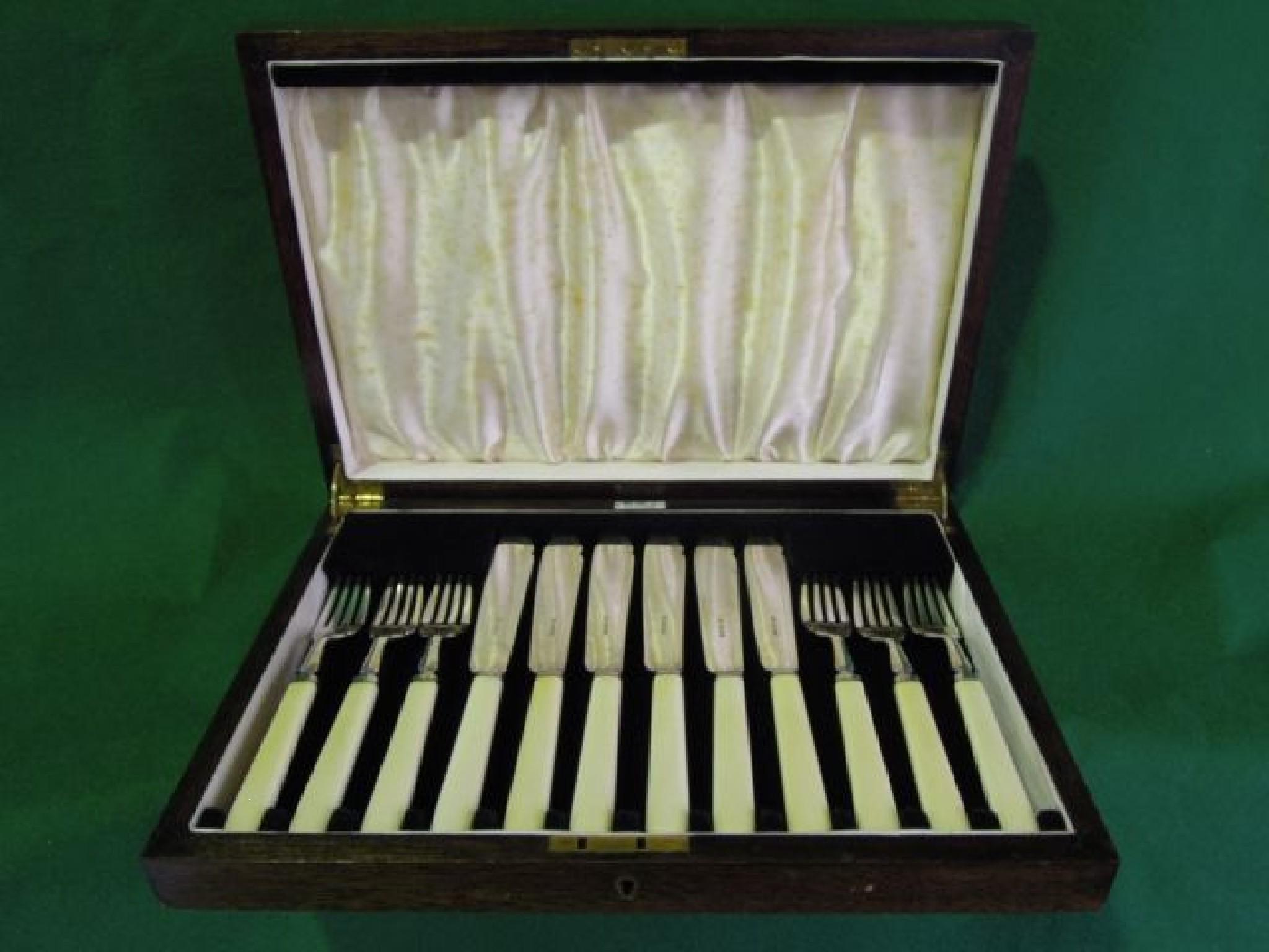 Appraisal: A cased set of six fish knives and forks hallmarked