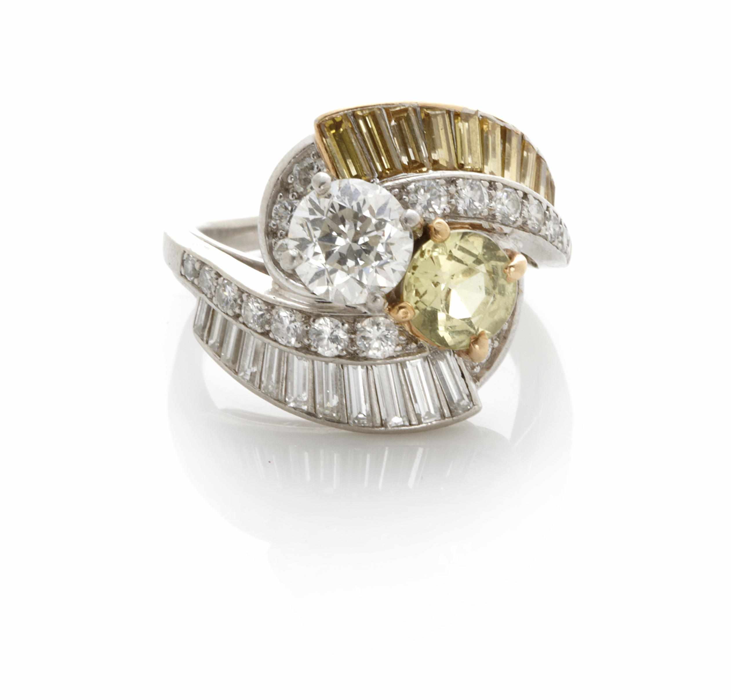 Appraisal: A diamond colored diamond yellow stone and platinum ring signed