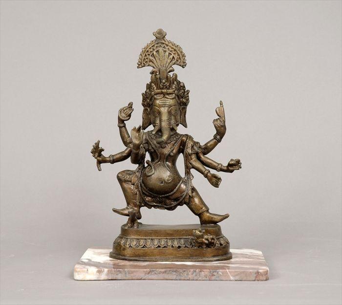 Appraisal: Indian Patinated Metal Ganesh Figure Mounted on marble plinth figure