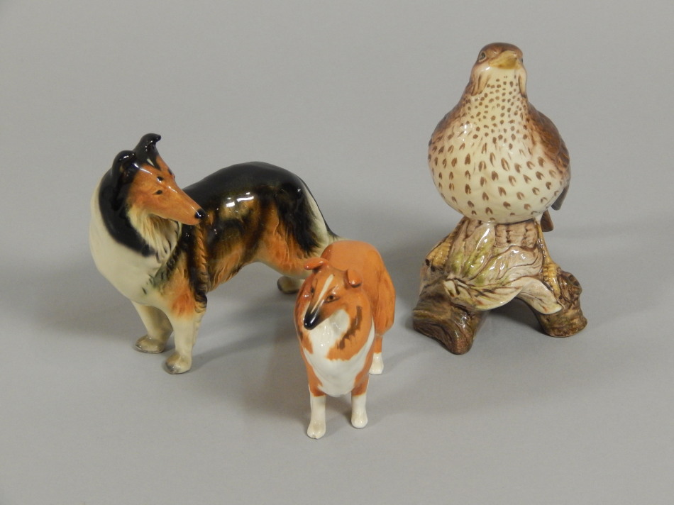 Appraisal: Three animal figures to include a Beswick wren perched on