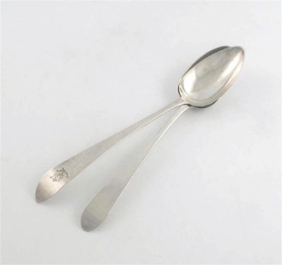 Appraisal: Two George III Irish serving spoons with pointed ends one