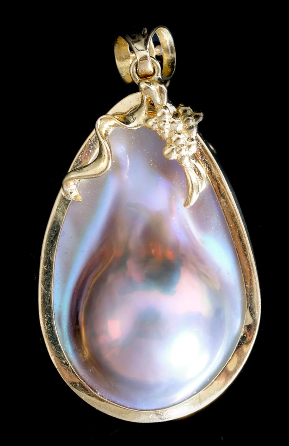 Appraisal: K YELLOW GOLD MOBE PEARL PENDANT k yellow gold and