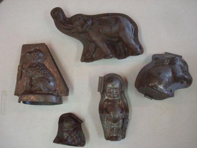 Appraisal: Molds Pieces Elephant kewpie dogs a rabbit From an East