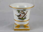 Appraisal: A Herend urn shaped vase on paw feet decorated with