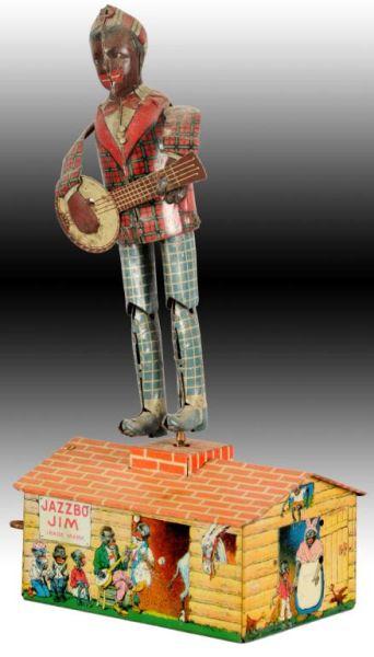 Appraisal: Strauss Tin Wind-Up Jazzbo Jim Roof Dancing Toy Description Toy