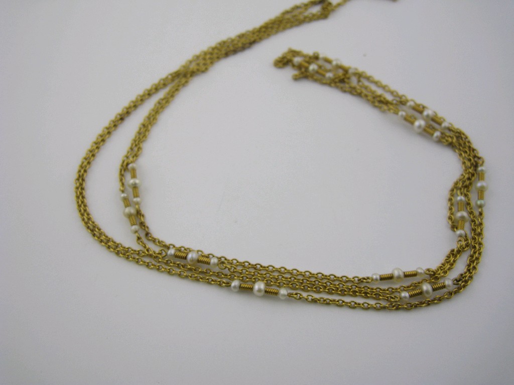 Appraisal: An ct gold Guard Chain interspersed with twelve fancy links