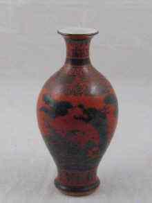 Appraisal: A Japanese vase decoratedwith a sea serpent in black and