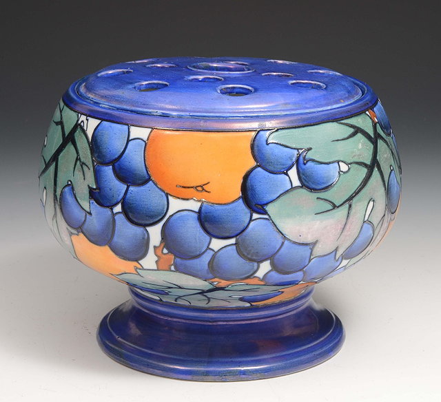 Appraisal: A Burleigh ware blue ground flower vasedesigned by Charlotte Rhead