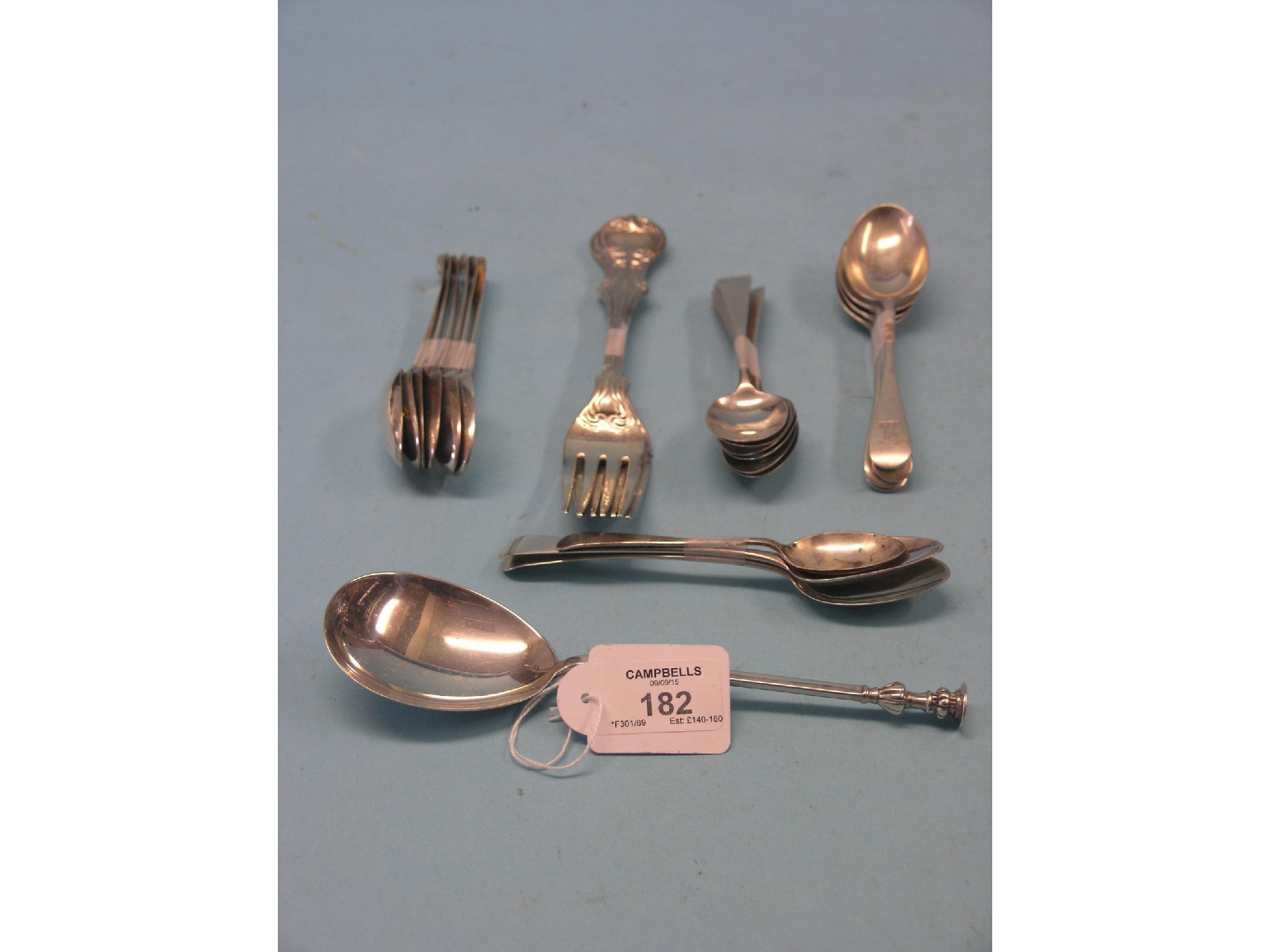 Appraisal: Assorted silver cutlery including replica seal-top spoon and a pair