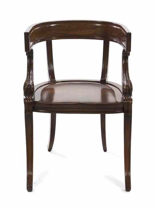 Appraisal: A Continental Mahogany Open Armchair having a curved crest rail