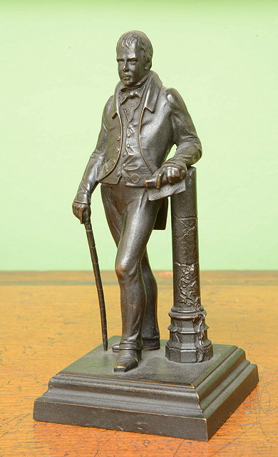 Appraisal: A TH CENTURY BRONZE SCULPTURE of Sir Walter Scott standing