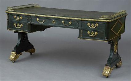 Appraisal: REGENCY GREEN-PAINTED AND PARCEL-GILT KNEEHOLE DESK The tooled green leather-paneled