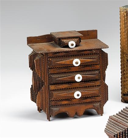 Appraisal: Tramp miniature chest of drawers late th early th century