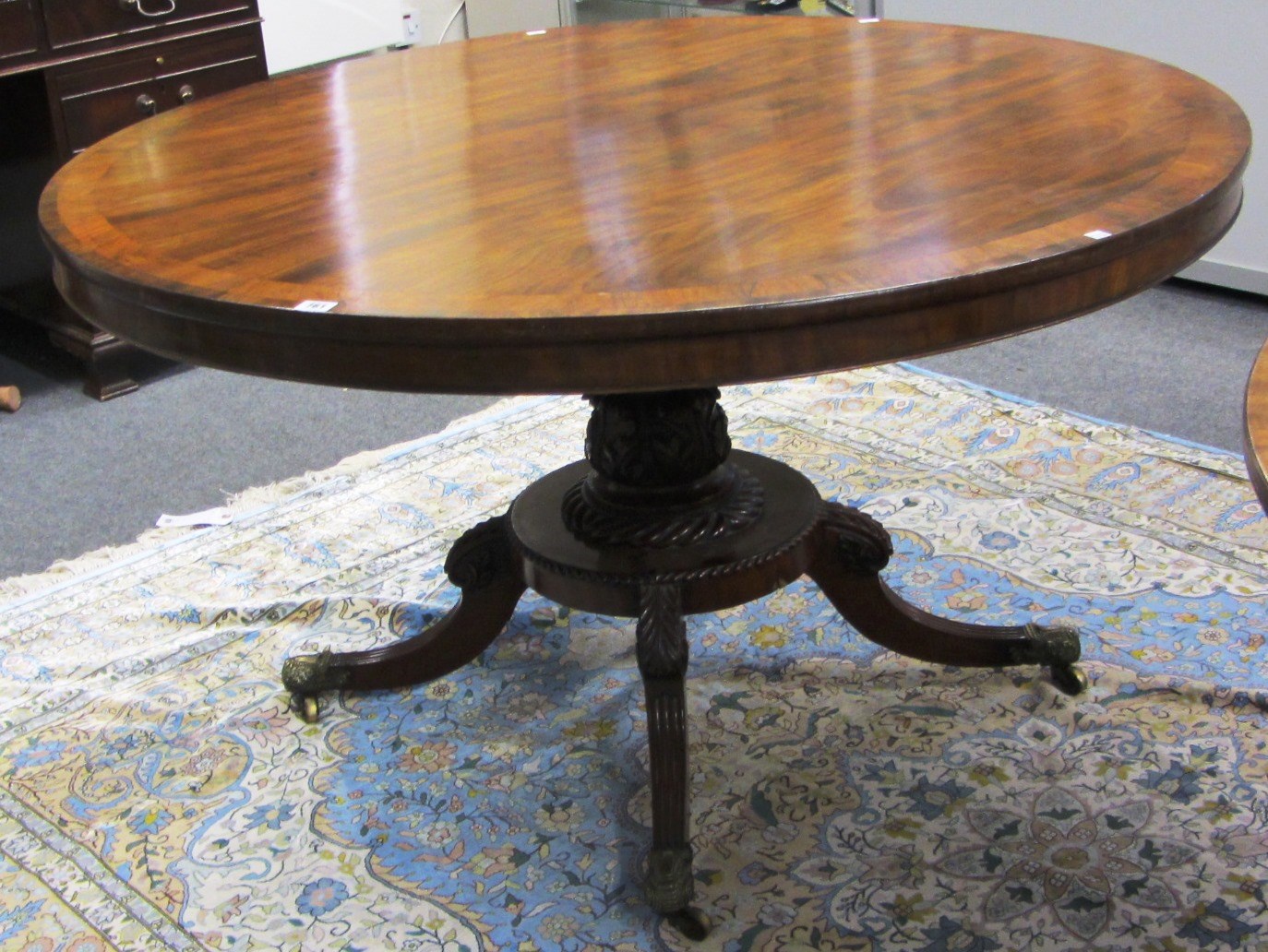 Appraisal: A Regency mahogany dining table the crossbanded circular top on