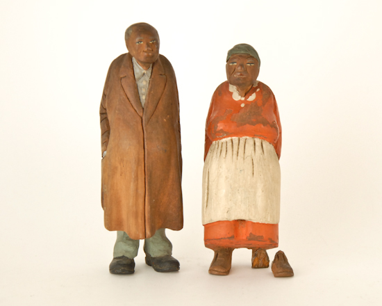 Appraisal: Folk Art African-American Wood Carving man and woman in casual