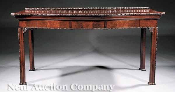 Appraisal: An Antique Chippendale-Style Carved Mahogany Serving Table serpentine top with