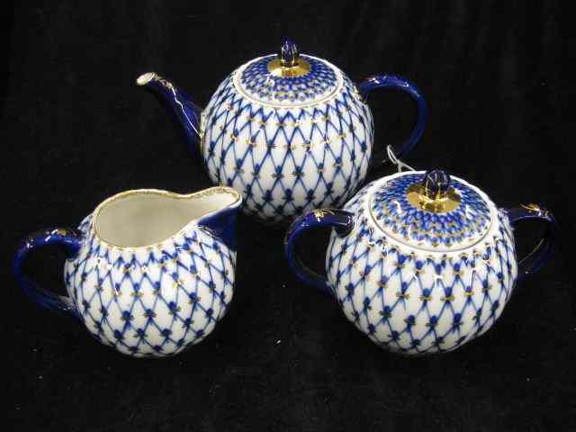 Appraisal: Russian Porcelain Tea Set cobalt lattice design gold trim excellent