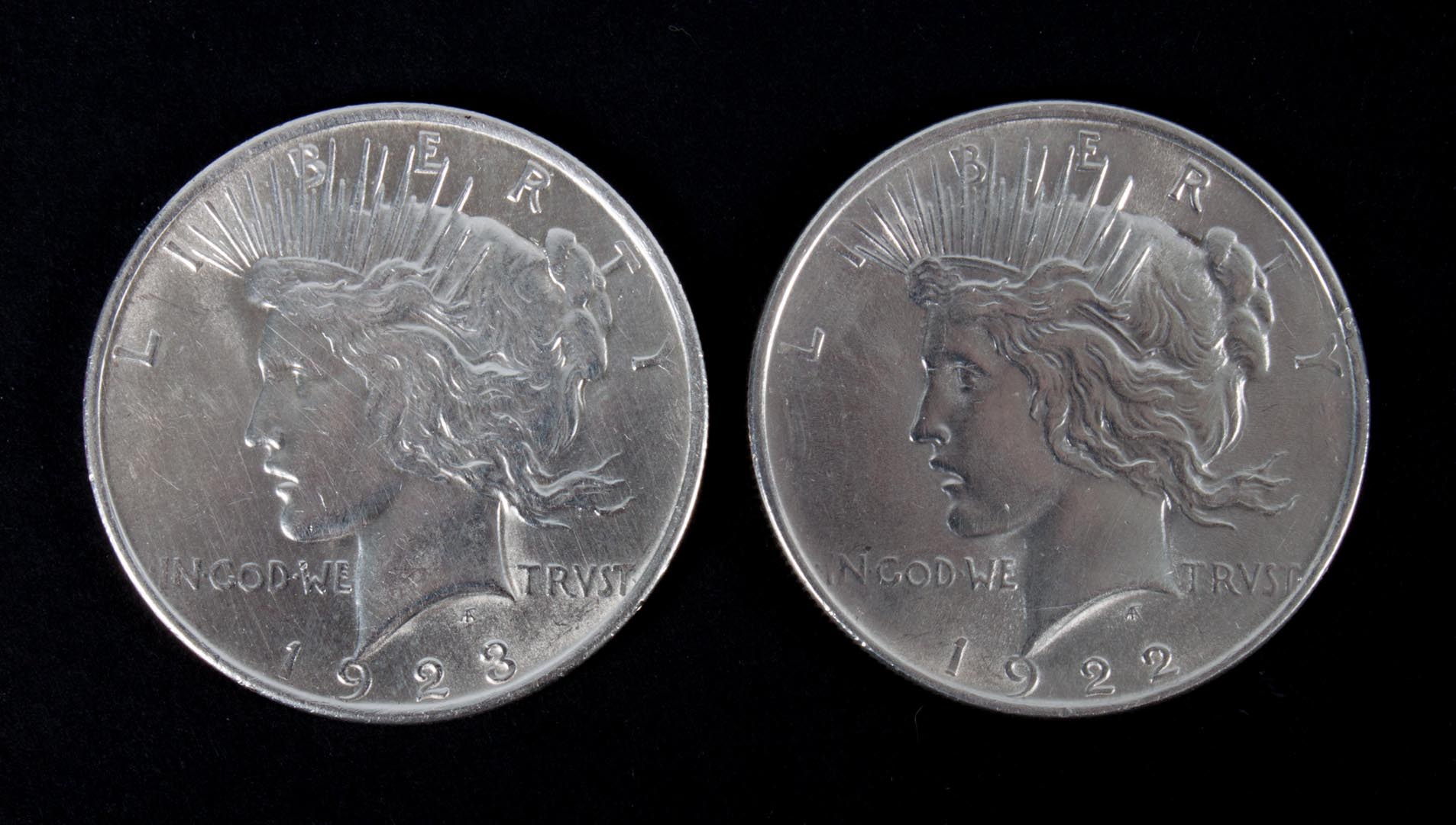 Appraisal: Two United States silver Peace dollars -' each MS-