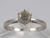 Appraisal: An carat gold diamond solitaire ring the round brilliant cut