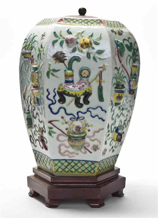 Appraisal: A Chinese Porcelain Lidded Vessel of tapering hexagonal form having