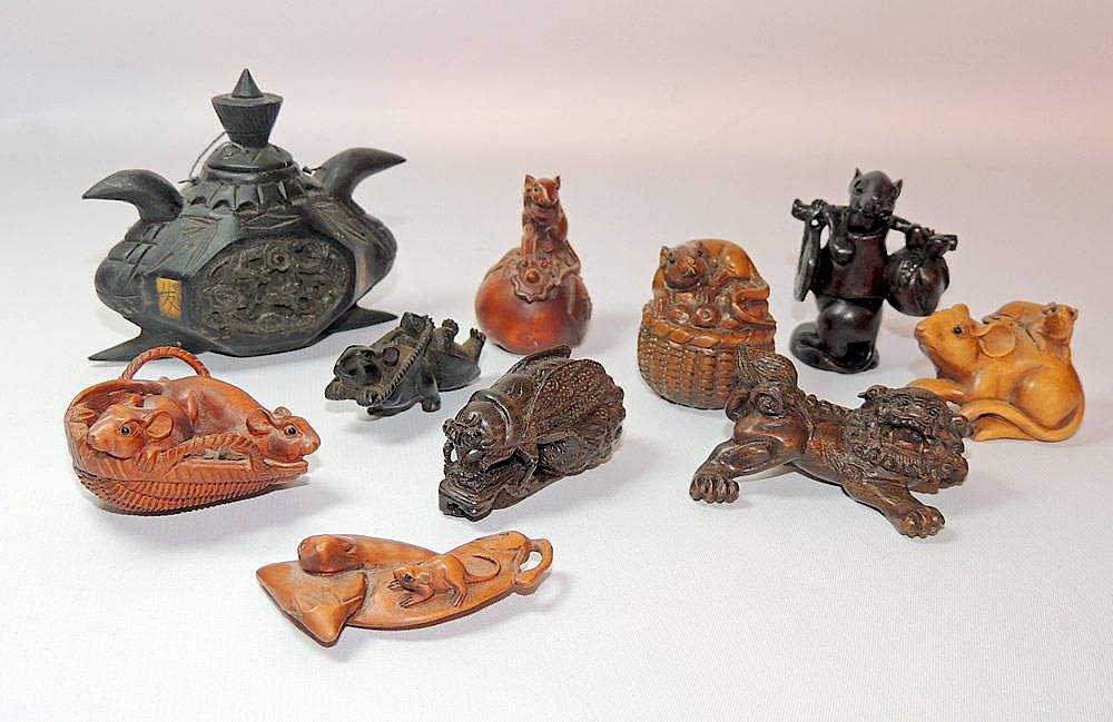 Appraisal: Grouping of Wood Carved Netsukes and Snuff Bottle Grouping to