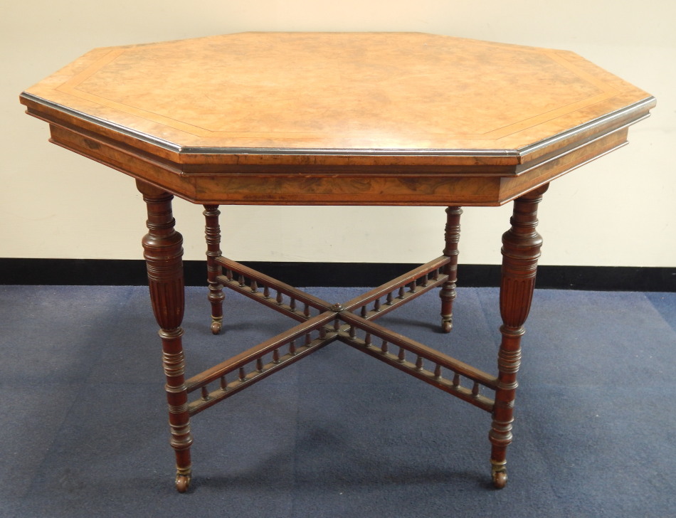 Appraisal: A late Victorian walnut centre table with quarter veneered and