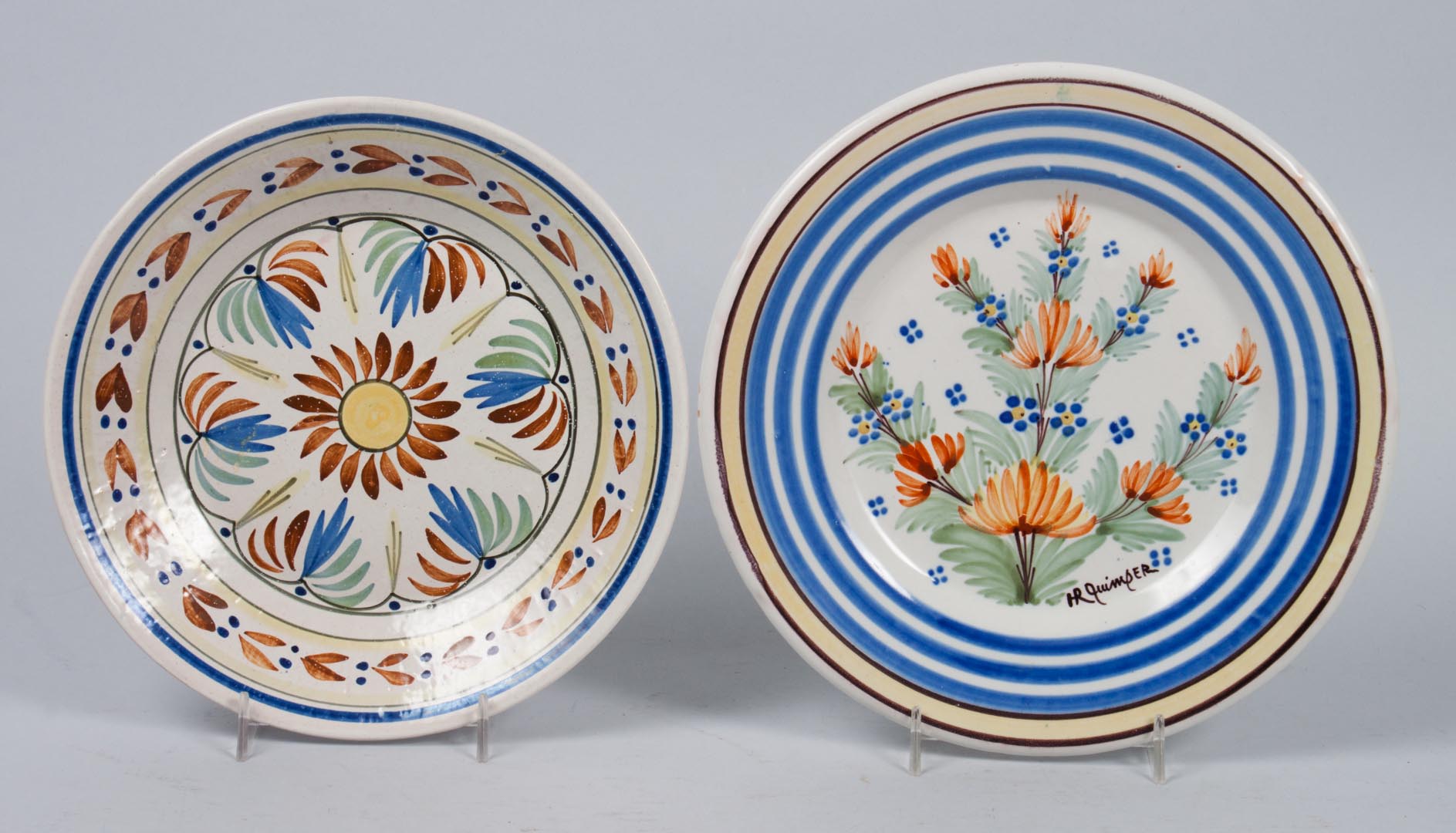 Appraisal: Two Quimper faience plates first quarter- th century geometric pattern