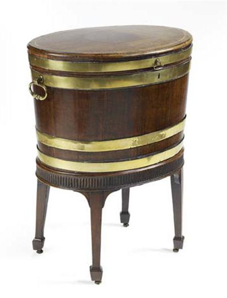 Appraisal: A George III mahogany and brass bound oval wine cooler