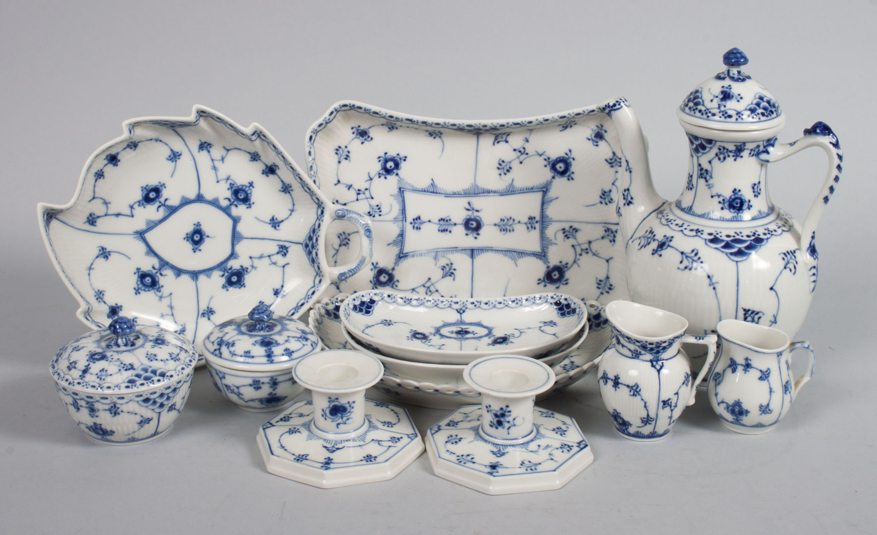 Appraisal: Twelve Royal Copenhagen table articles including teapot pairs of creamers