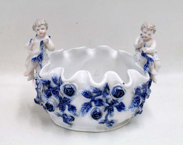 Appraisal: GERMAN PORCELAIN FIGURAL BOWL blue and white with pair of