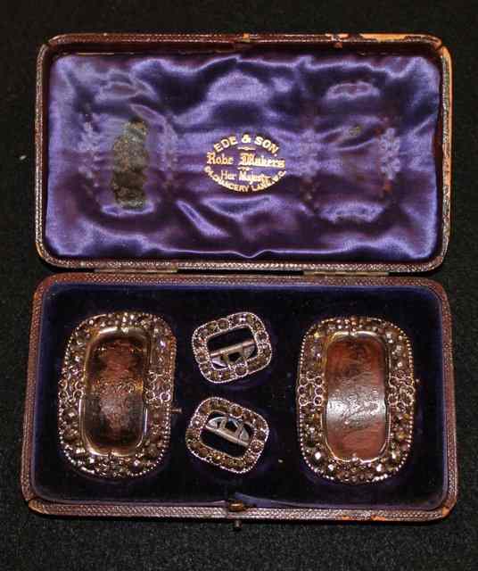 Appraisal: A CASED SET OF GEORGIAN BUCKLES two large two small