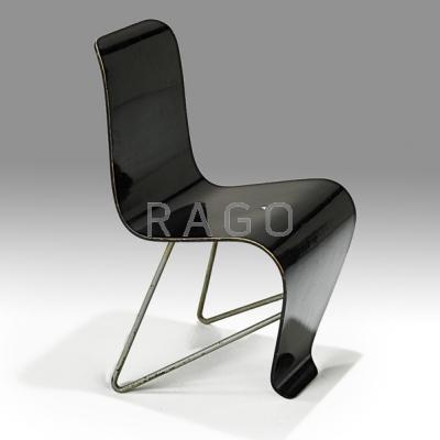 Appraisal: ANDRE BLOC Bellevue chair France s Enameled plywood enameled steel