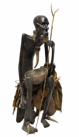 Appraisal: Large African wood carving seated tribal figure in drape and