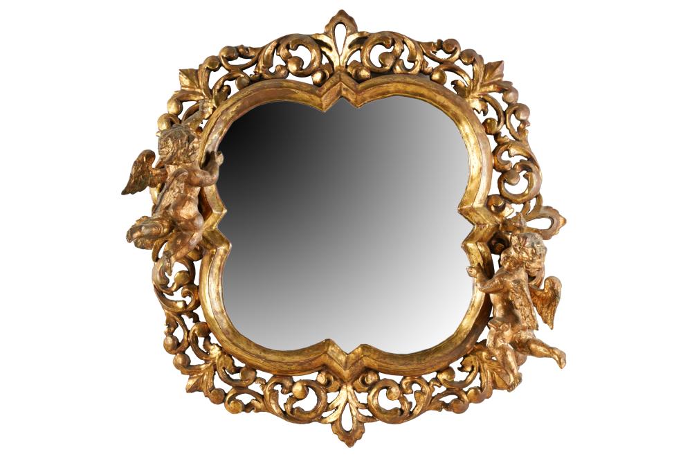 Appraisal: CONTINENTAL BAROQUE STYLE GILTWOOD WALL MIRRORantique the pierced surround flanked