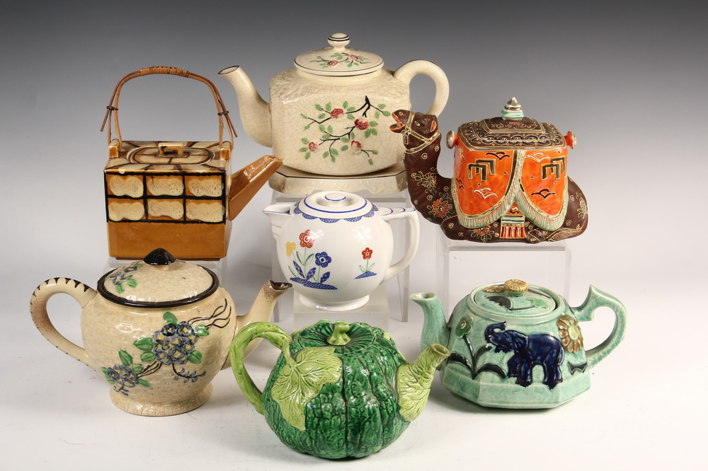 Appraisal: PORCELAIN OR POTTERY TEA POTS - Including Four Majolica one