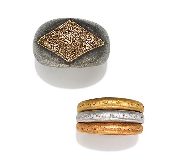 Appraisal: A pair of eighteen karat gold and silver rings Buccellati