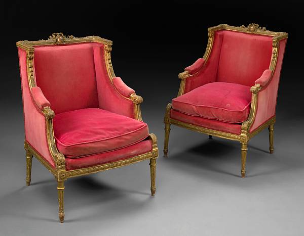 Appraisal: A pair of Louis XVI style carved giltwood bergeres The