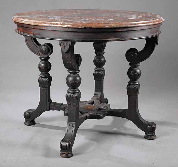 Appraisal: An American Renaissance Walnut Center Table c the circular variegated