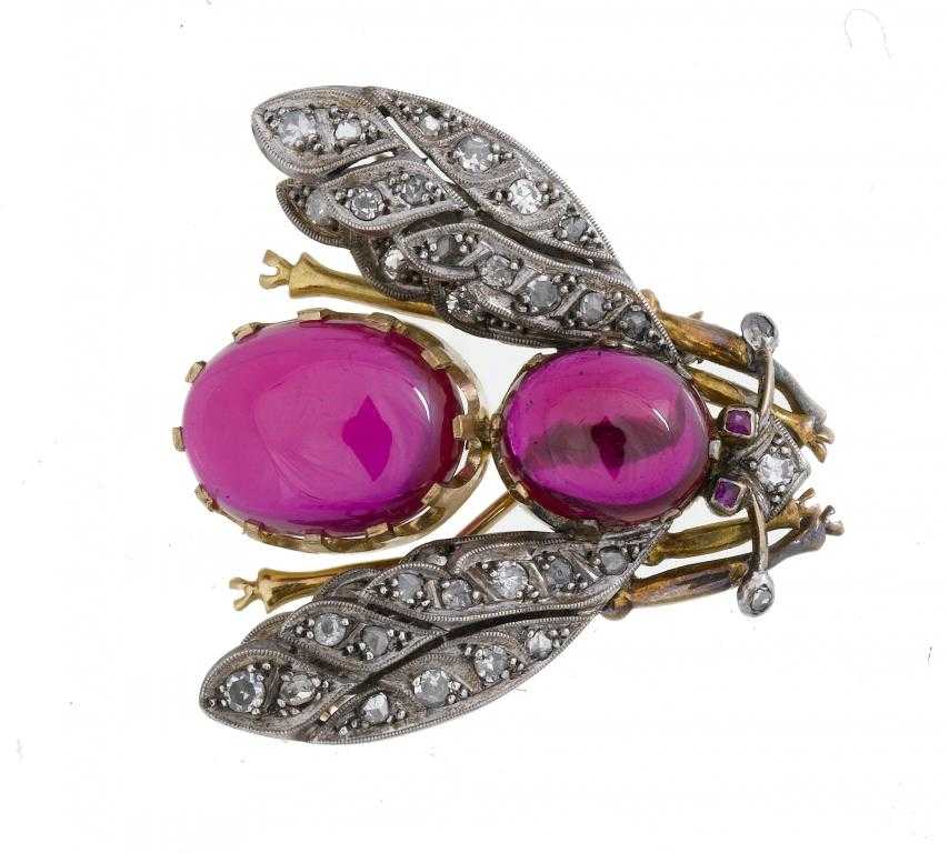 Appraisal: A DIAMOND AND SYNTHETIC RUBY BEE BROOCH with two principal