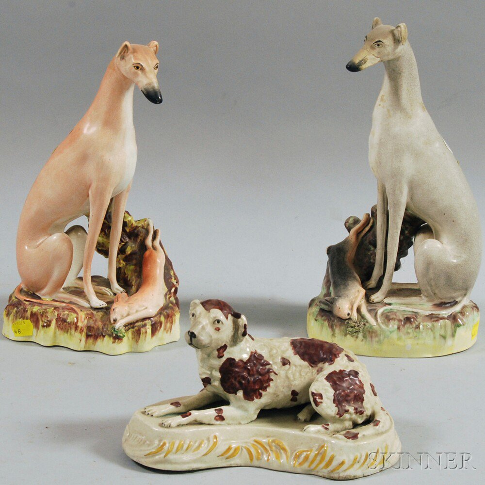 Appraisal: Two Large Staffordshire Pottery Whippet with Game Figurines and a